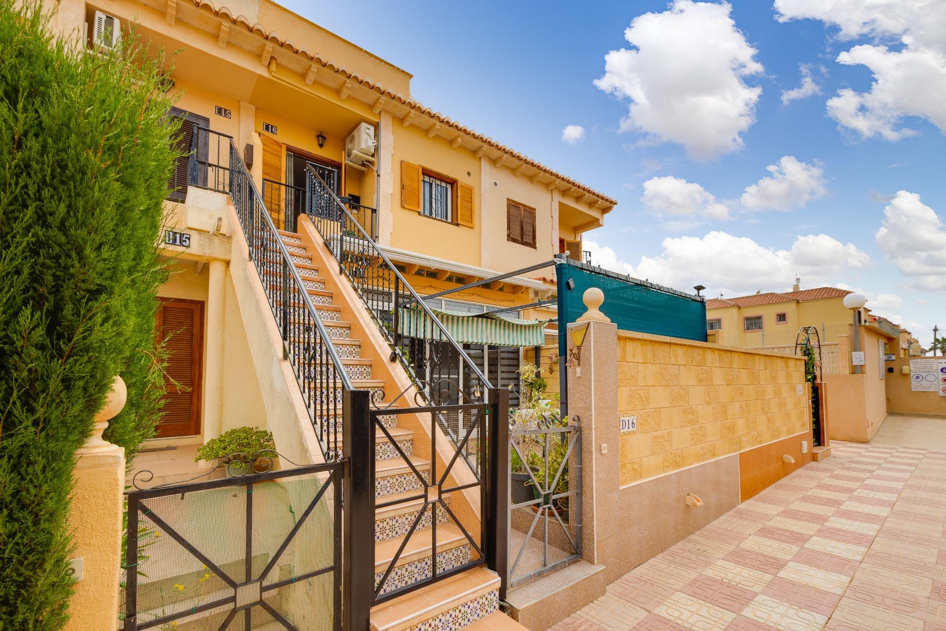 Exterior staircase leading to top-floor level, La Siesta bungalow complex