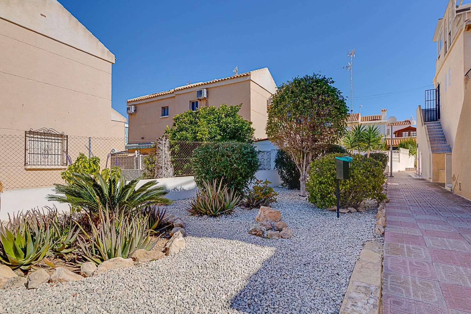 Rendered facade of residential bungalow complex, La Siesta, Torrevieja