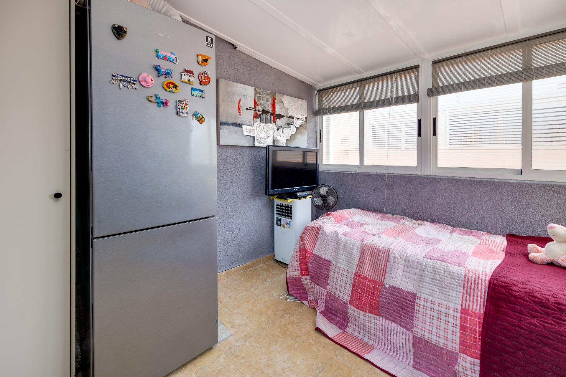 Solarium tiled floor and open aspect, top-floor bungalow, La Siesta