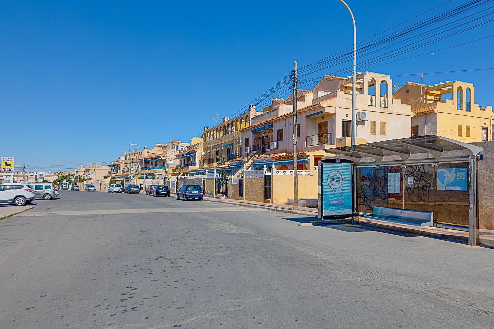 Neighbourhood rooftops and streets visible from solarium, La Siesta, Torrevieja
