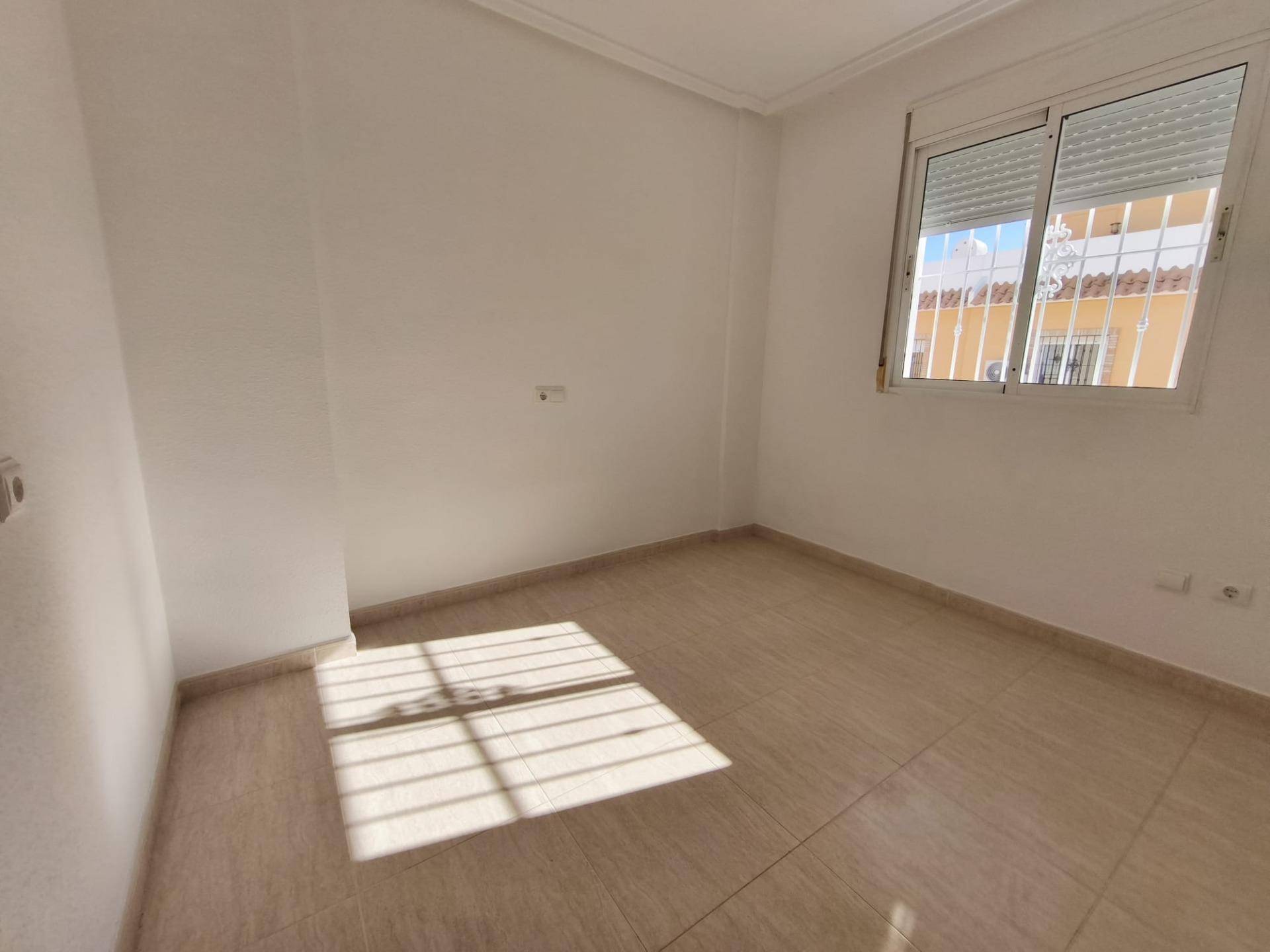 Rooftop solarium with views across Lo Marabú urbanisation, Rojales