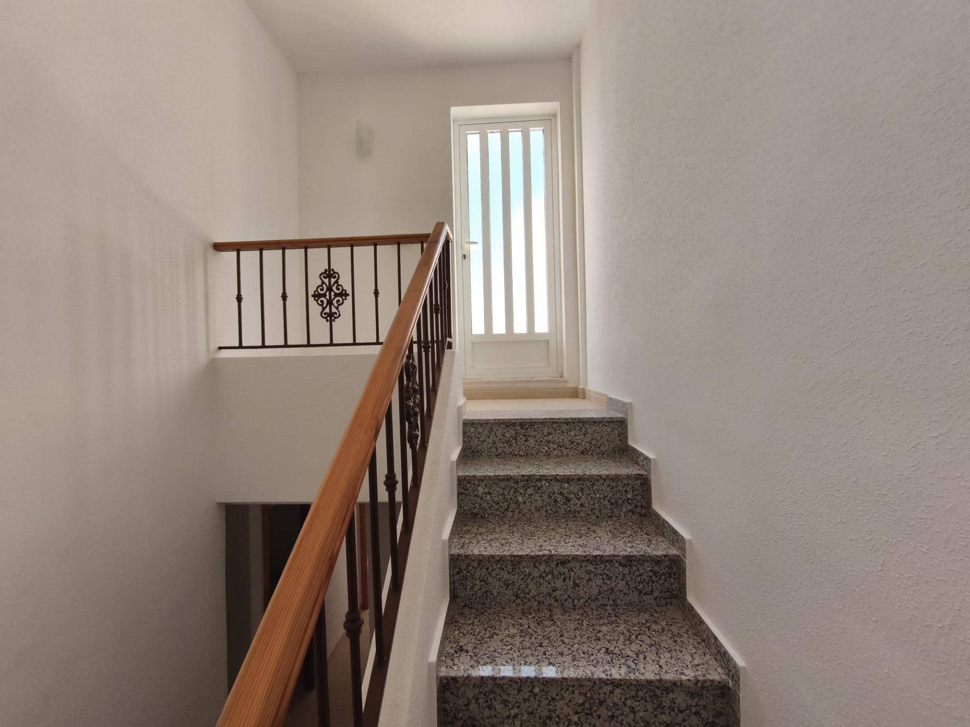 Street-level frontage showing access gate to private plot, Lo Marabú, Rojales