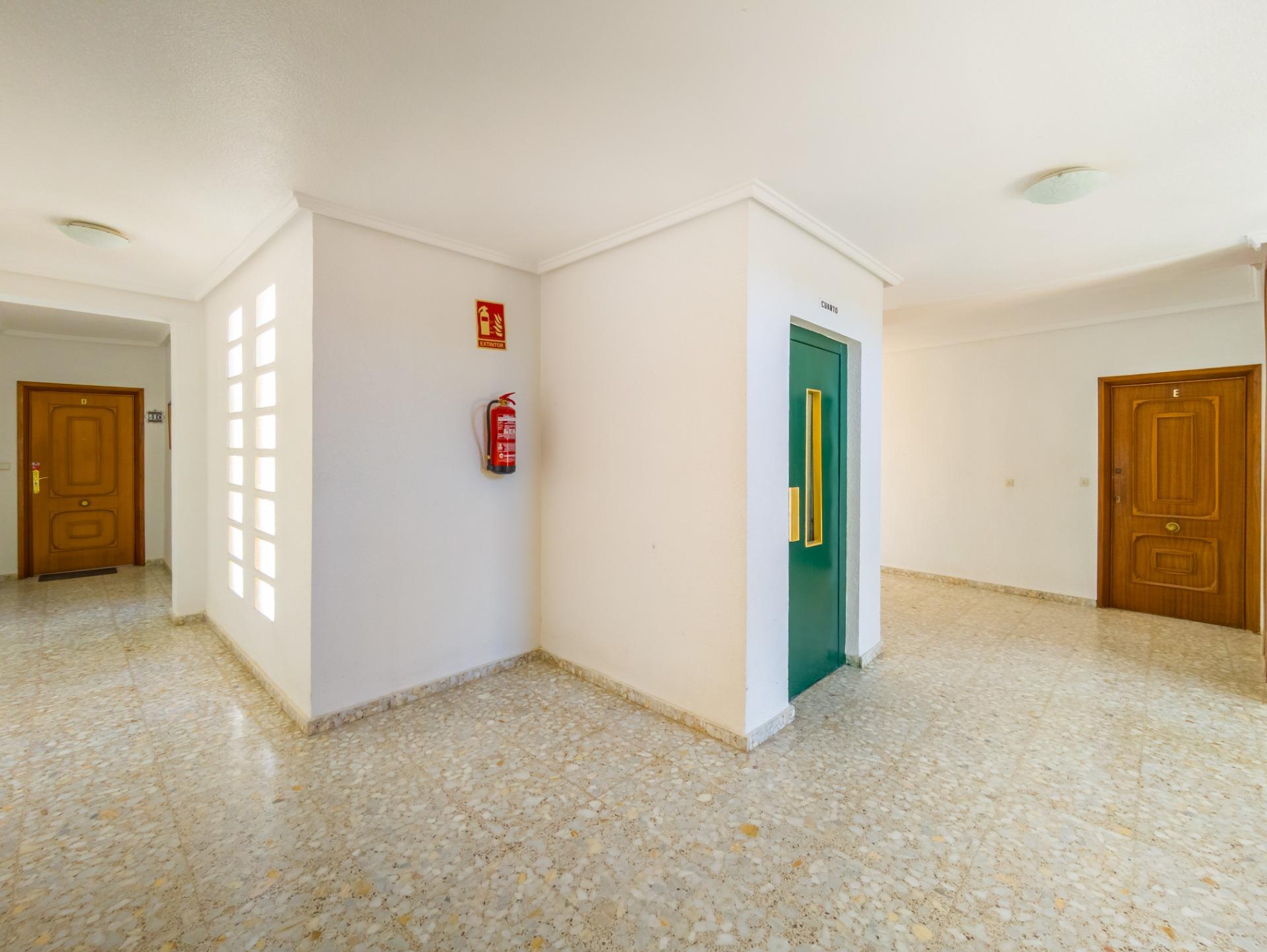 Bedroom with ceiling light and storage, apartment in Playa del Cura
