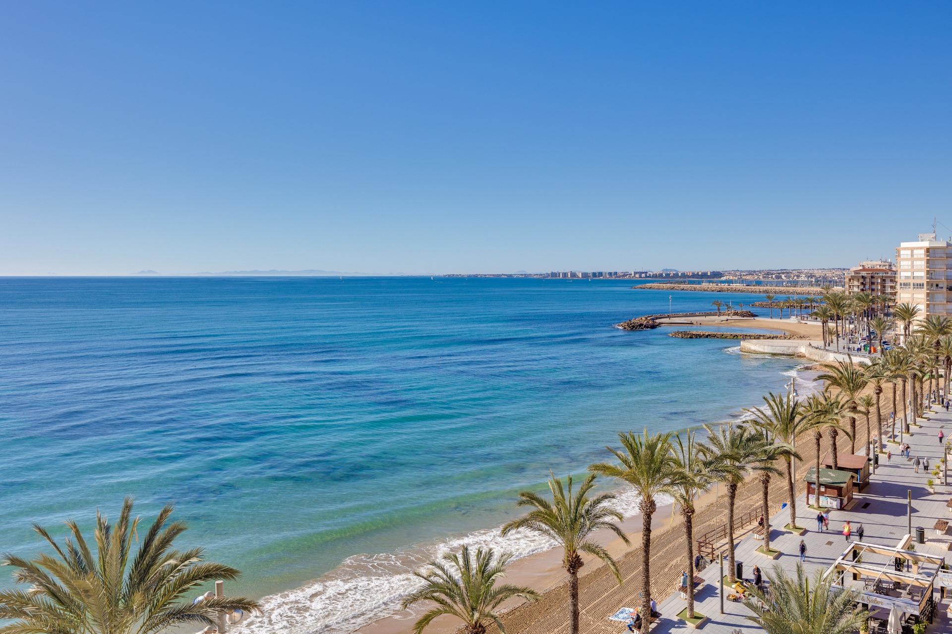 Ground-level view of urbanisation entrance, Playa de los Locos