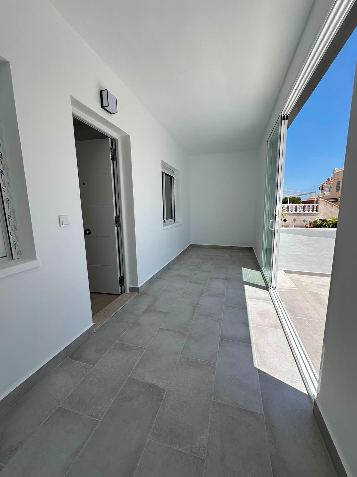 Rear patio in 2-bedroom bungalow, La Siesta, Torrevieja