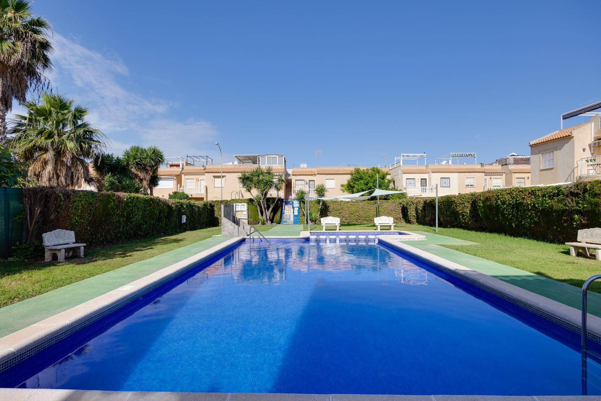 Solarium terrace with surrounding rooftop view, El Chaparral