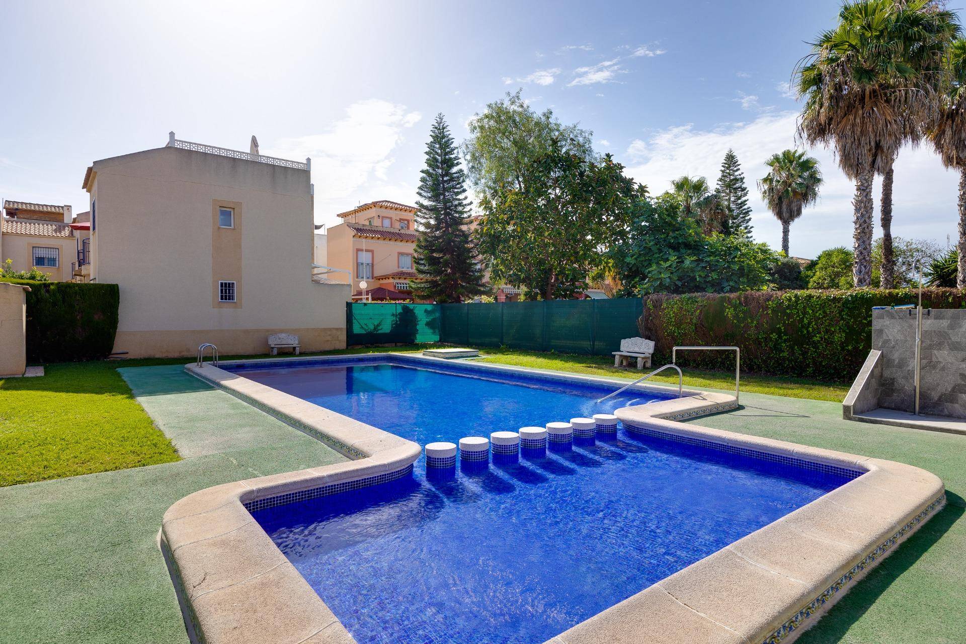Living area with balcony access in 2-bedroom bungalow, El Chaparral