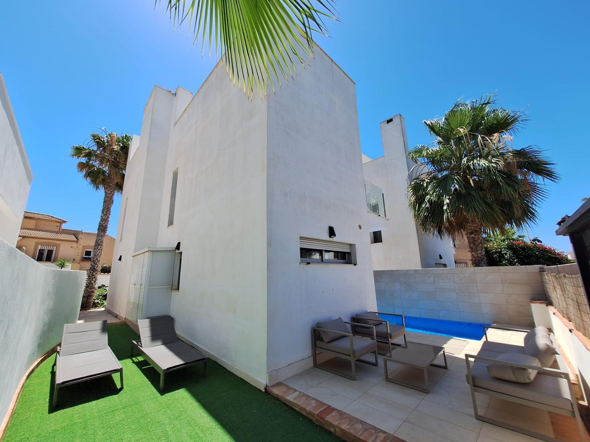 Private pool and paved surround at 3-bedroom villa in Los Frutales, Torrevieja