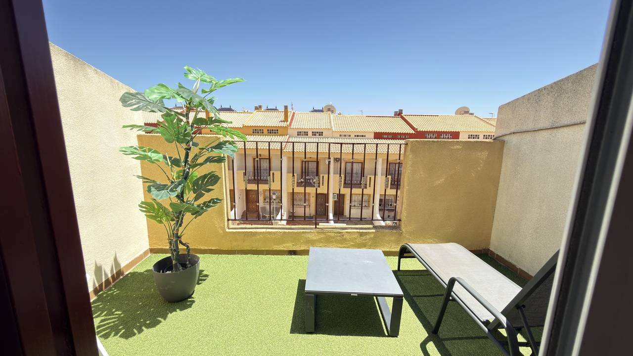 Rear garden boundary wall in villa, La Zenia