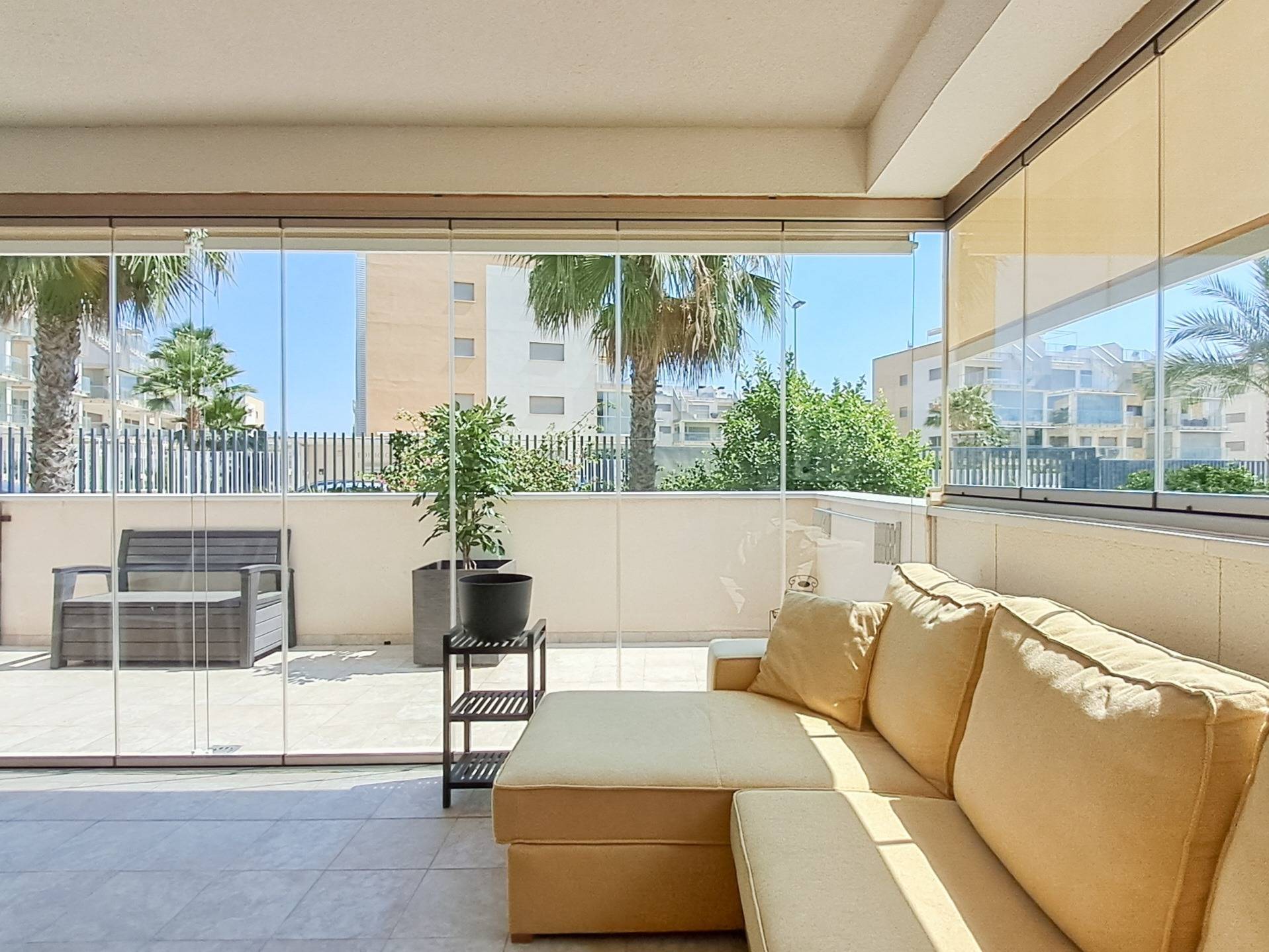 Glazed terrace viewed from living room, apartment in Los Dolses