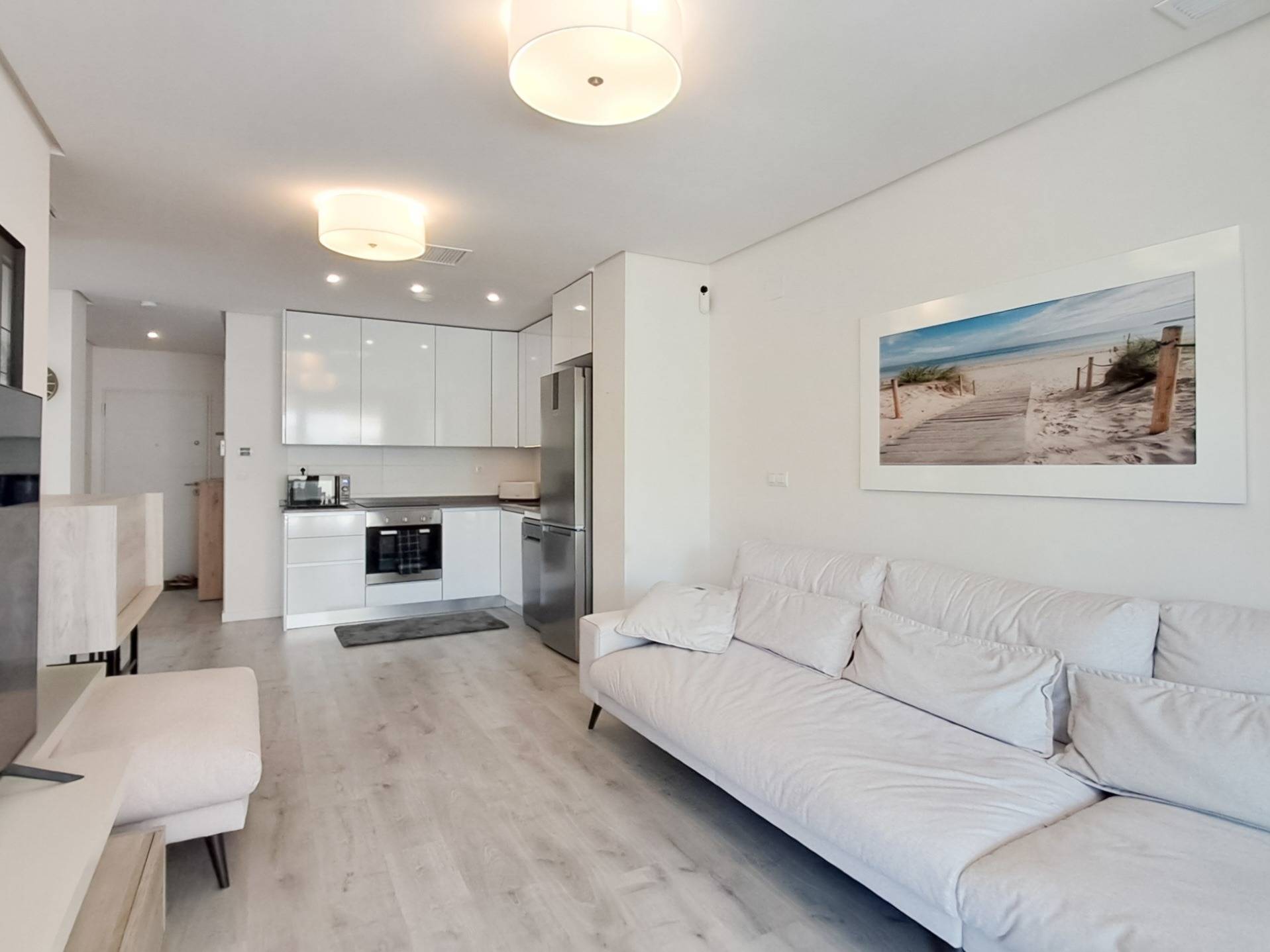 Living room with access to glazed terrace, Los Dolses apartment