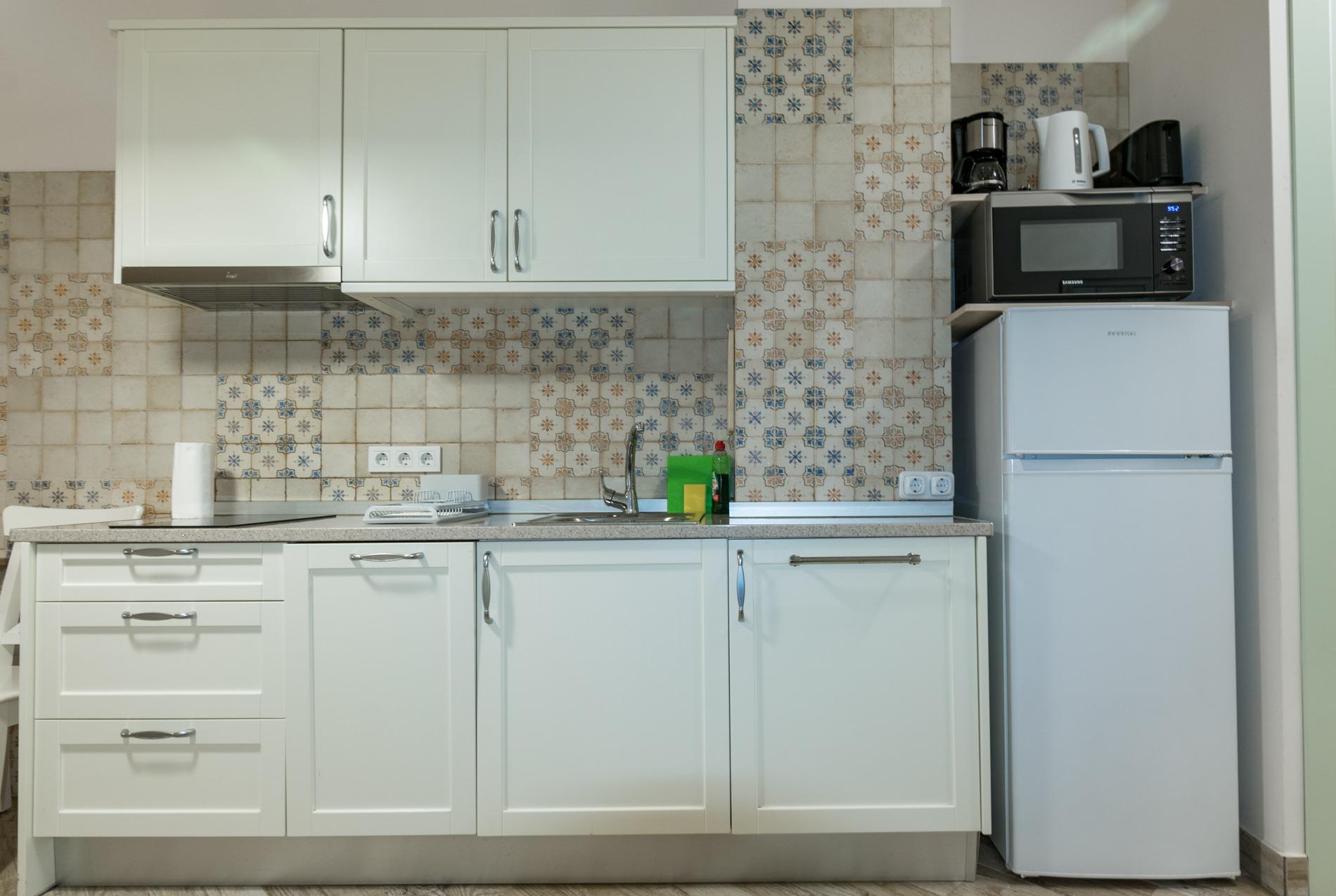Kitchen worktop and storage cupboards in studio, Los Frutales, Torrevieja