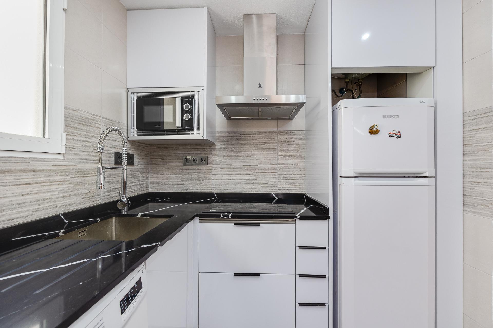 Bathroom fixtures and wall tiling in renovated bathroom, Playa del Cura, Torrevieja