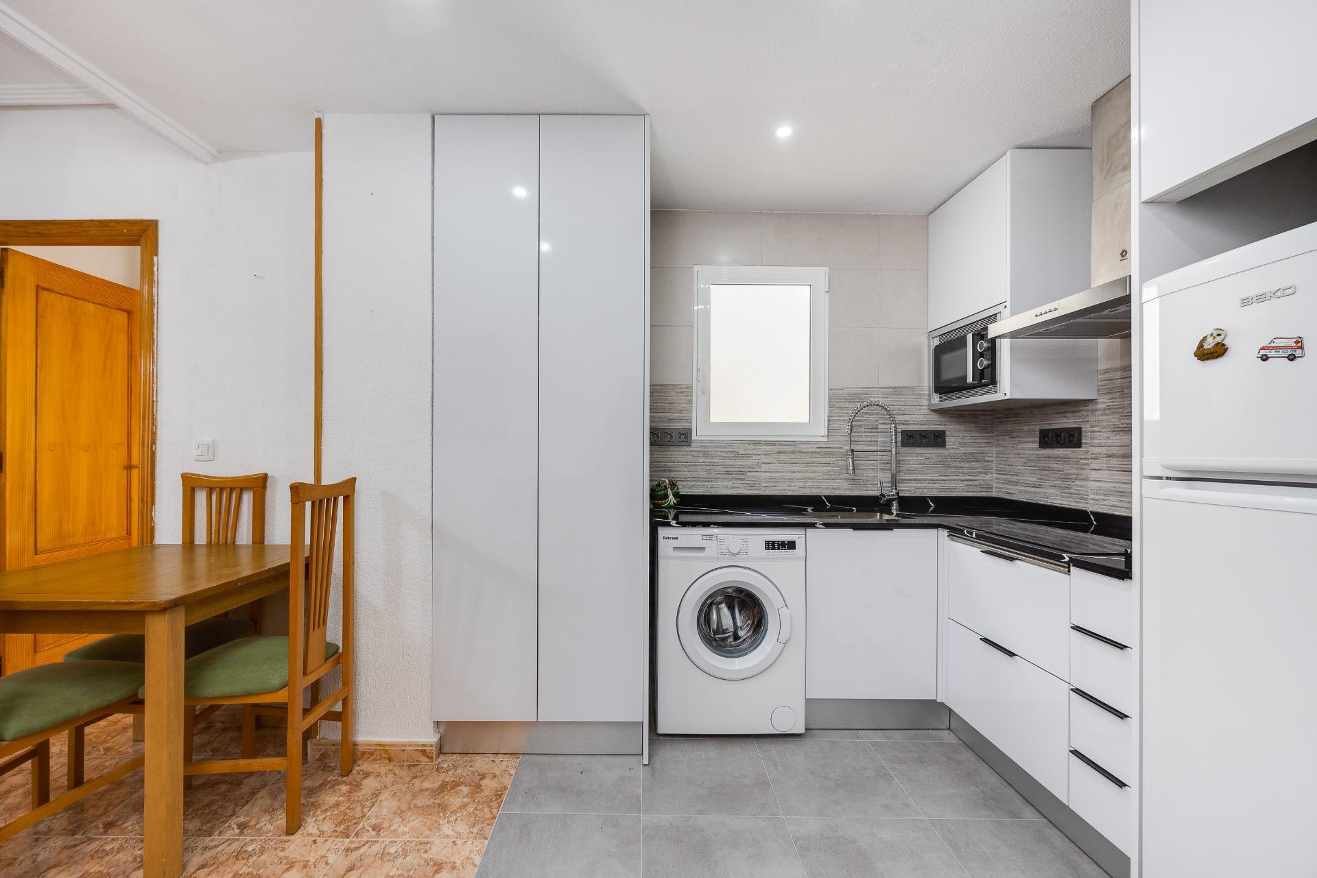 Kitchen cabinetry and work surface close-up, apartment in Playa del Cura
