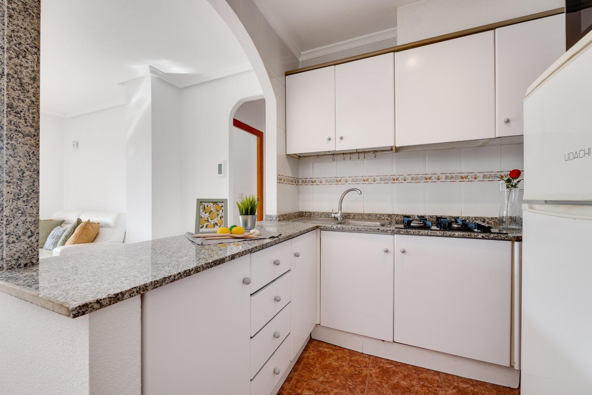 Southeast-facing terrace of first-floor apartment in Calas Blanca, Torrevieja