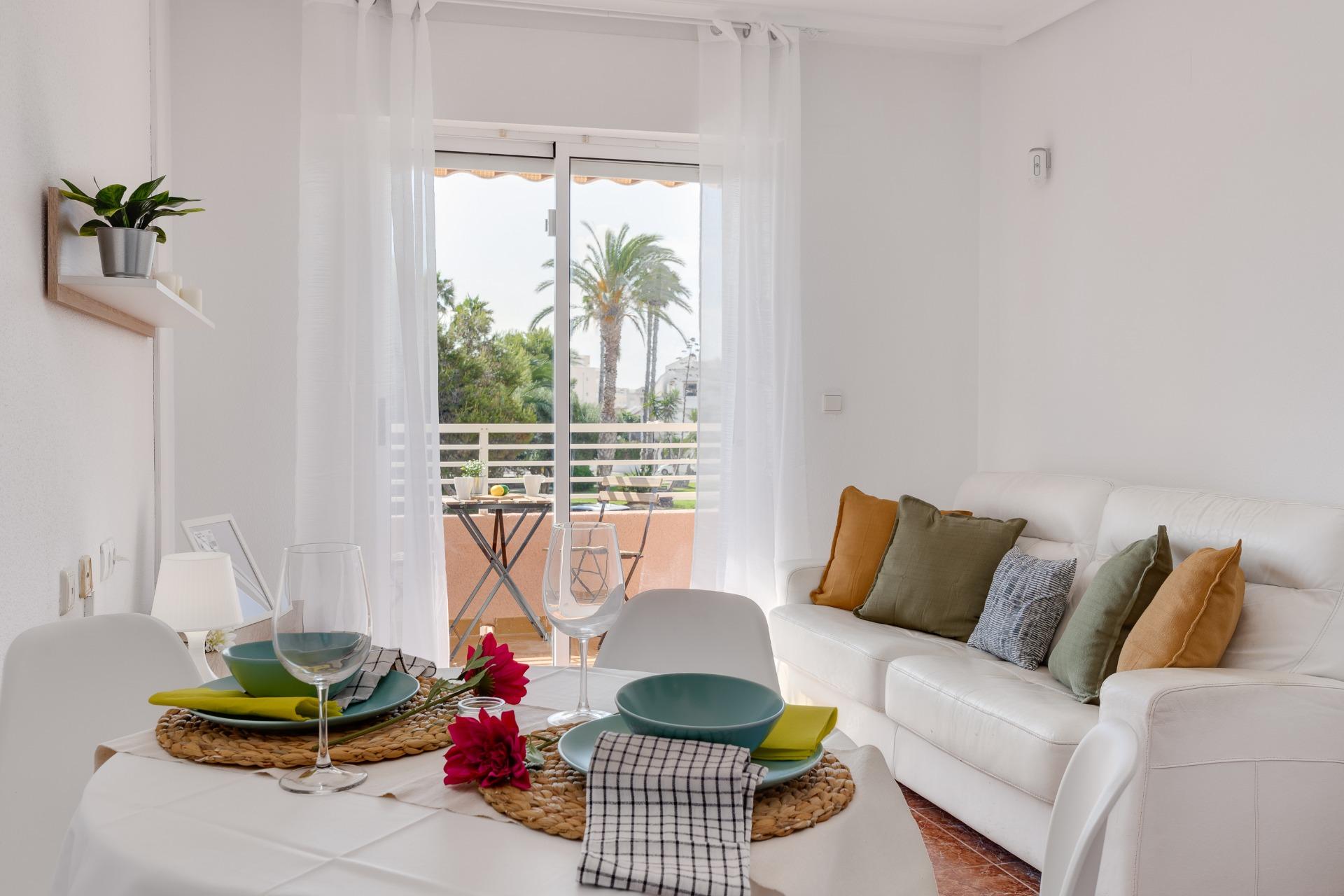 Communal pool area of gated urbanisation, Calas Blanca, Torrevieja