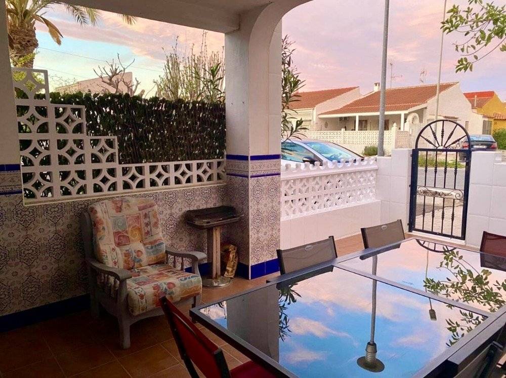 Villa for sale in Las Torretas III, Torrevieja - exterior view showing facade and garden plot