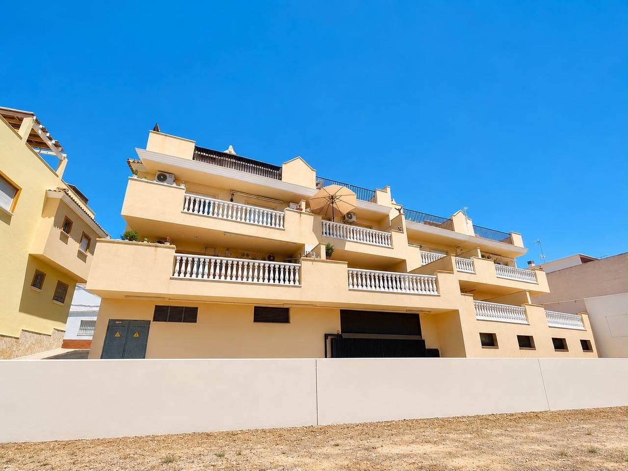 Street-level view of apartment building in Torremendo village, Orihuela