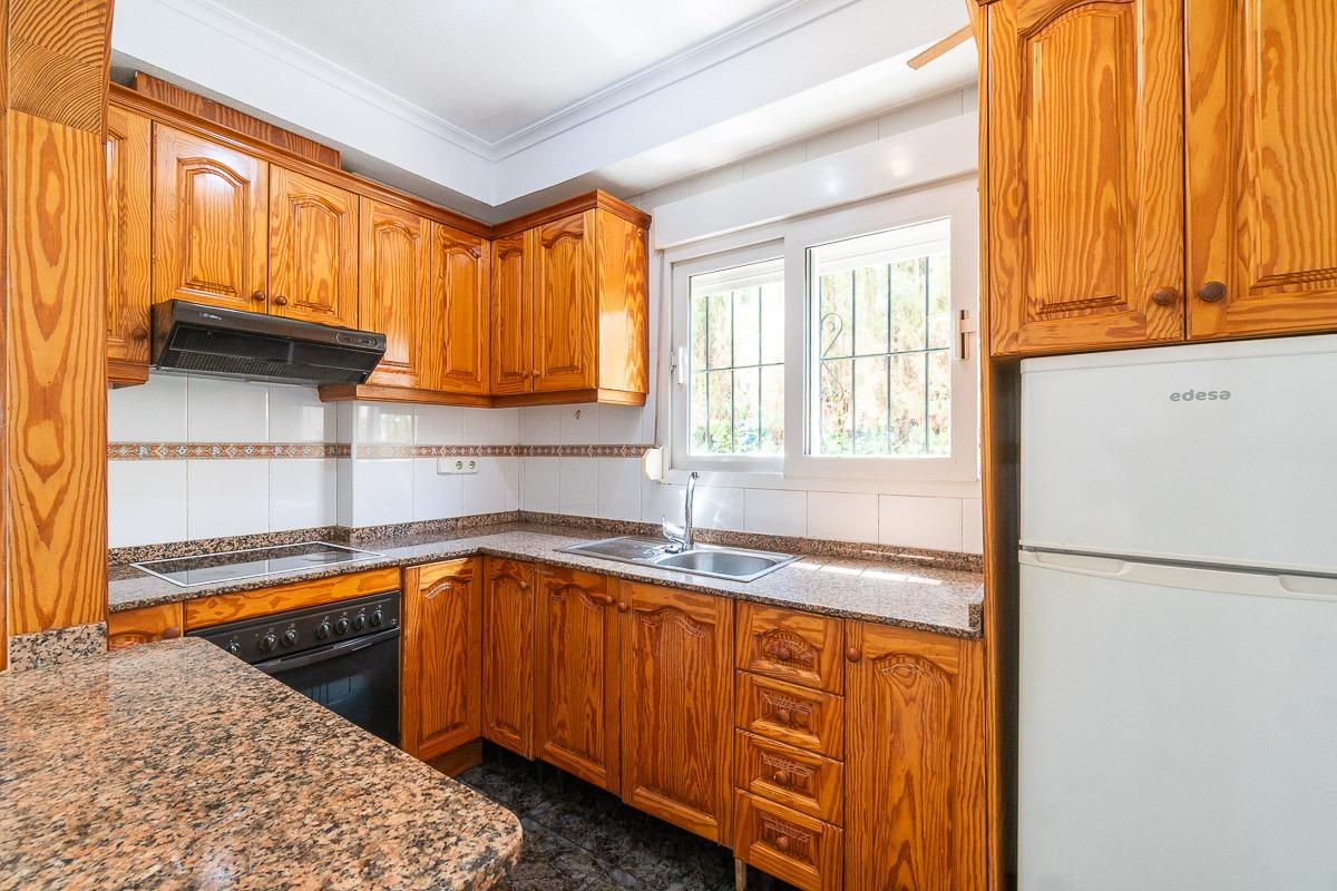 Pantry storage room adjoining kitchen, Playa Flamenca townhouse