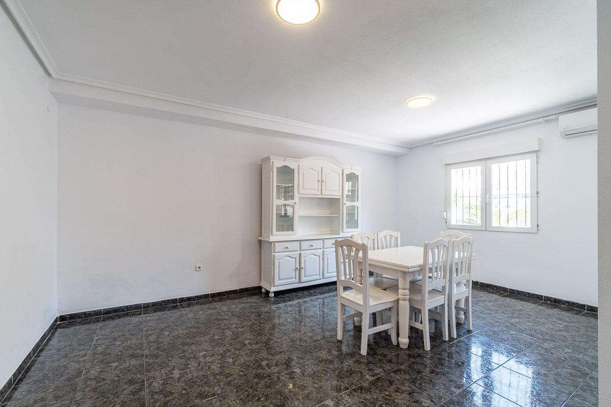 Private garden with pergola-covered terrace, Playa Flamenca townhouse