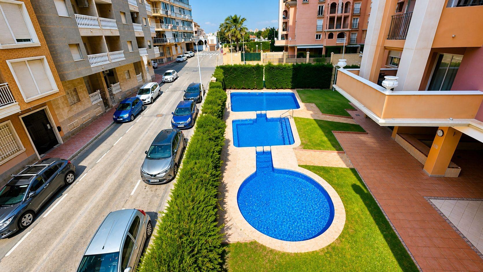 Communal pool with surrounding terrace in residential complex, Los Frutales, Torrevieja