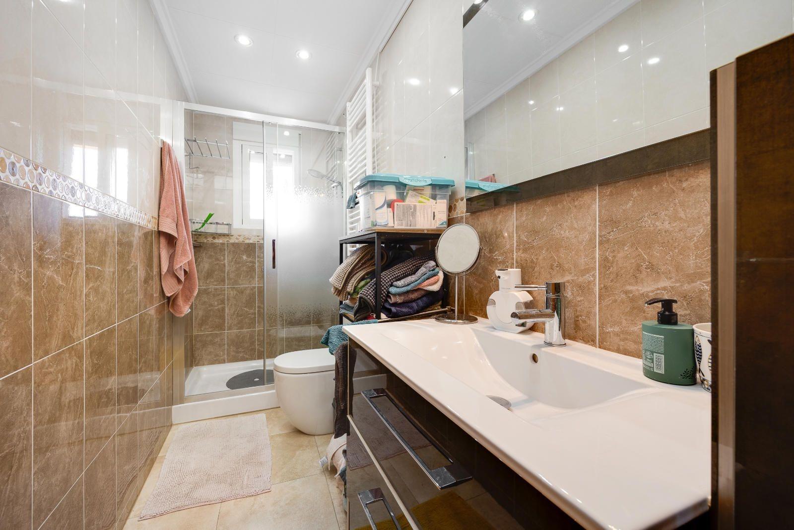 Pool with tiled surround and paved area, La Marina villa
