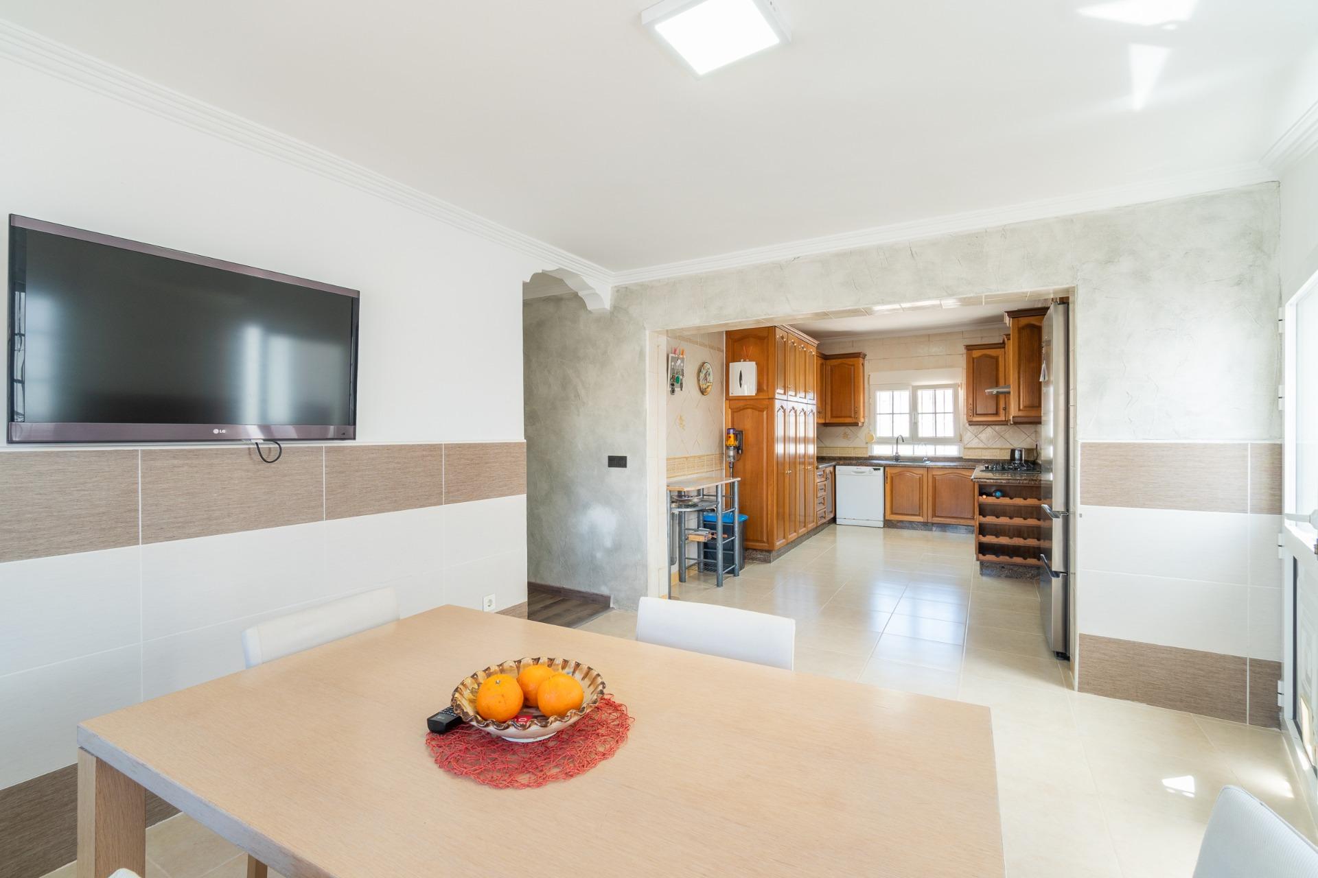 Terrace with outdoor seating overlooking garden, Torreta Florida villa