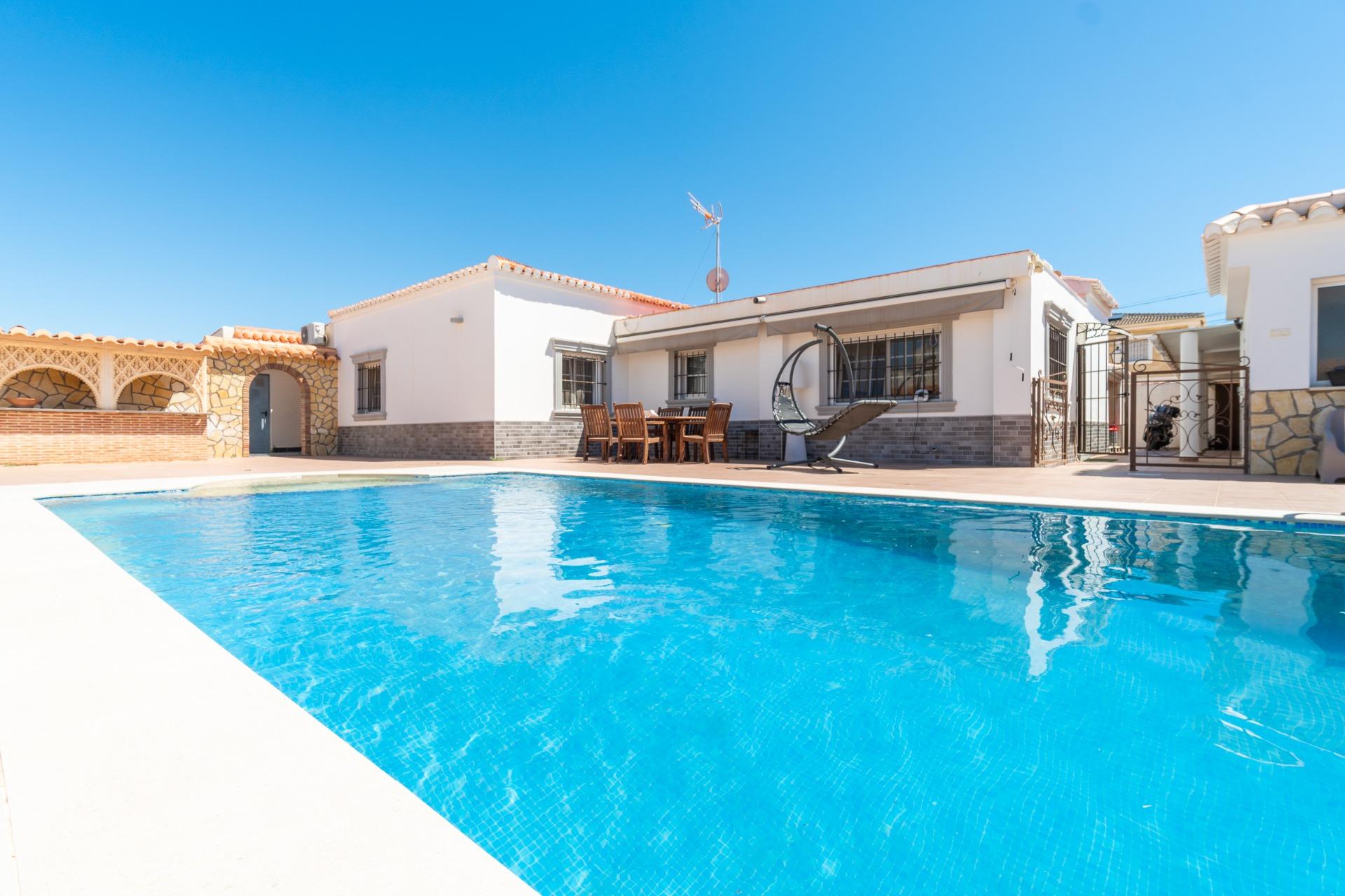 Front facade and entrance of south-facing detached villa, Torreta Florida, Torrevieja