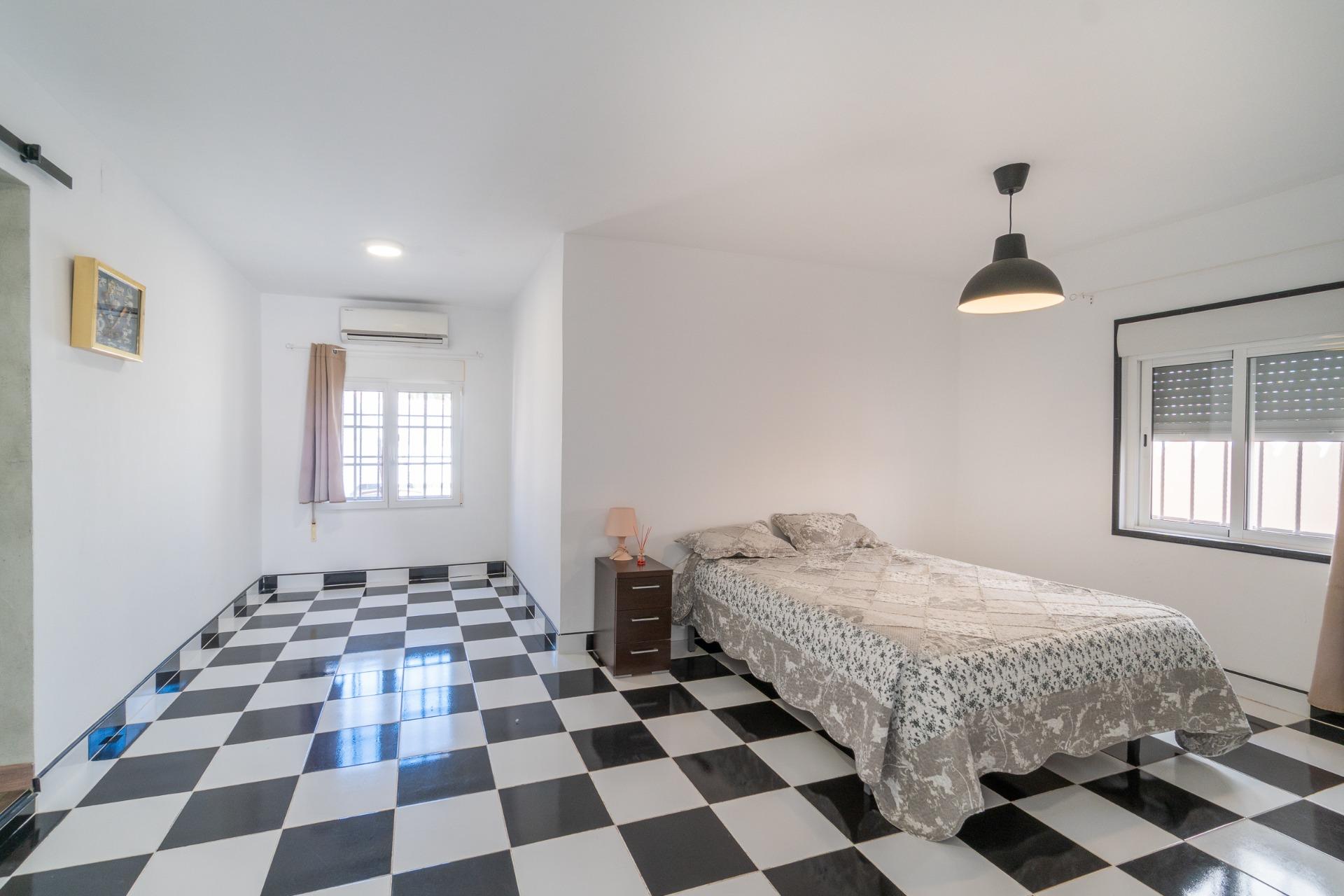 Covered terrace with garden view and outdoor seating, Torreta Florida villa