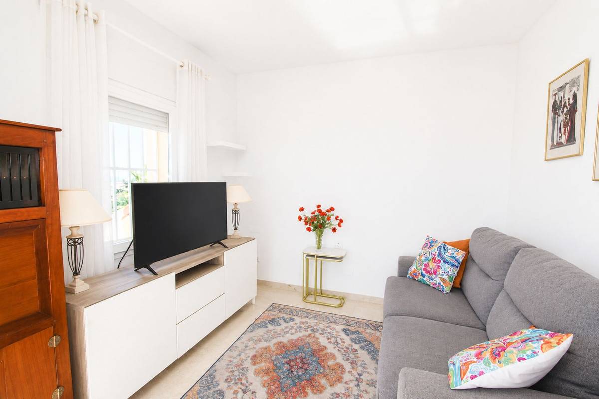 Wraparound terrace in evening light, corner duplex penthouse, Elviria Hills
