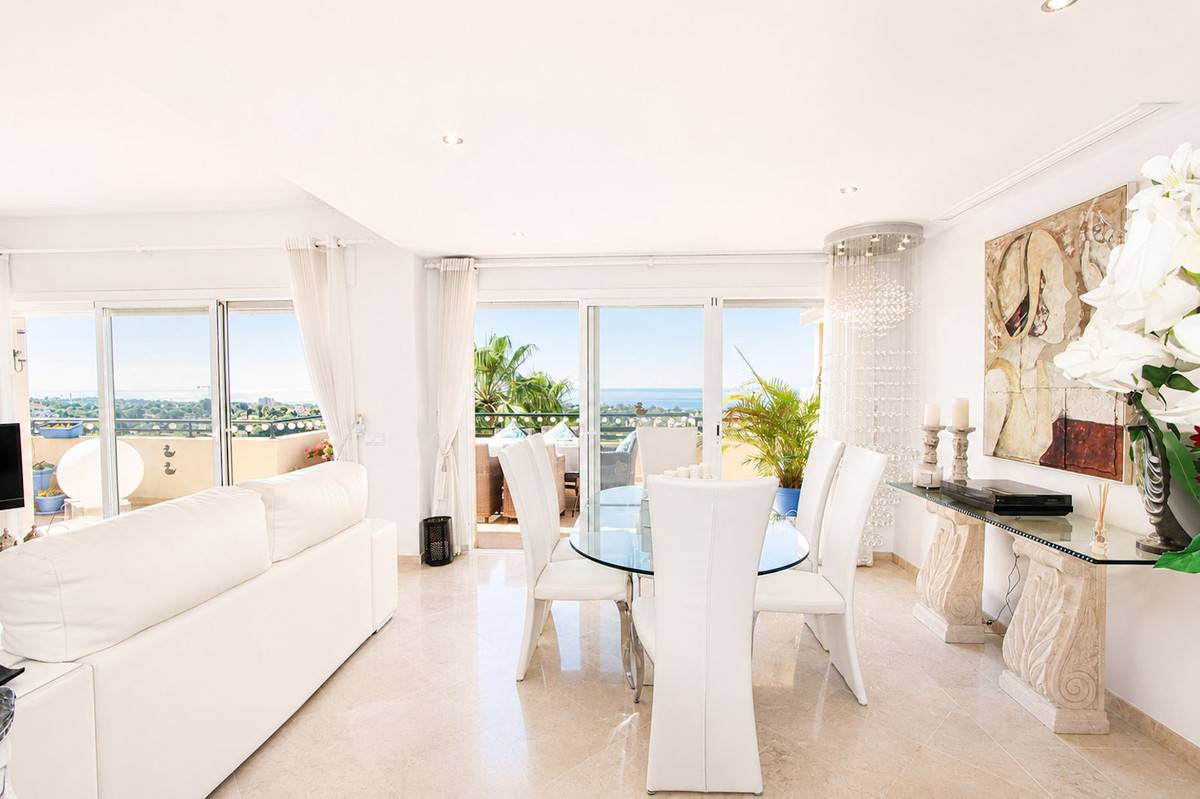 Outdoor seating area on south-facing terrace, corner duplex penthouse, Elviria Hills