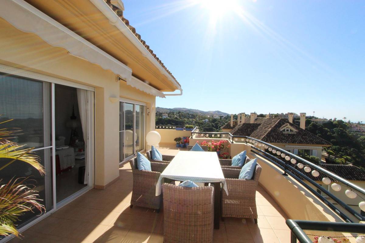 Panoramic view from upper terrace of corner penthouse, Elviria Hills, Marbella