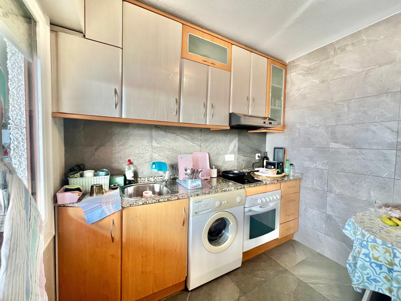 Kitchen balcony in 2-bedroom duplex penthouse, Playa de los Locos
