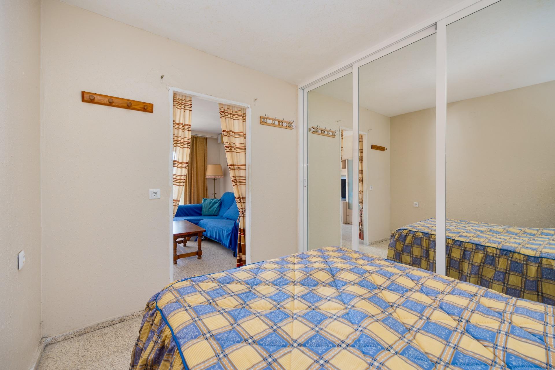 Bedroom interior with window in 1-bedroom apartment, La Mata, Torrevieja