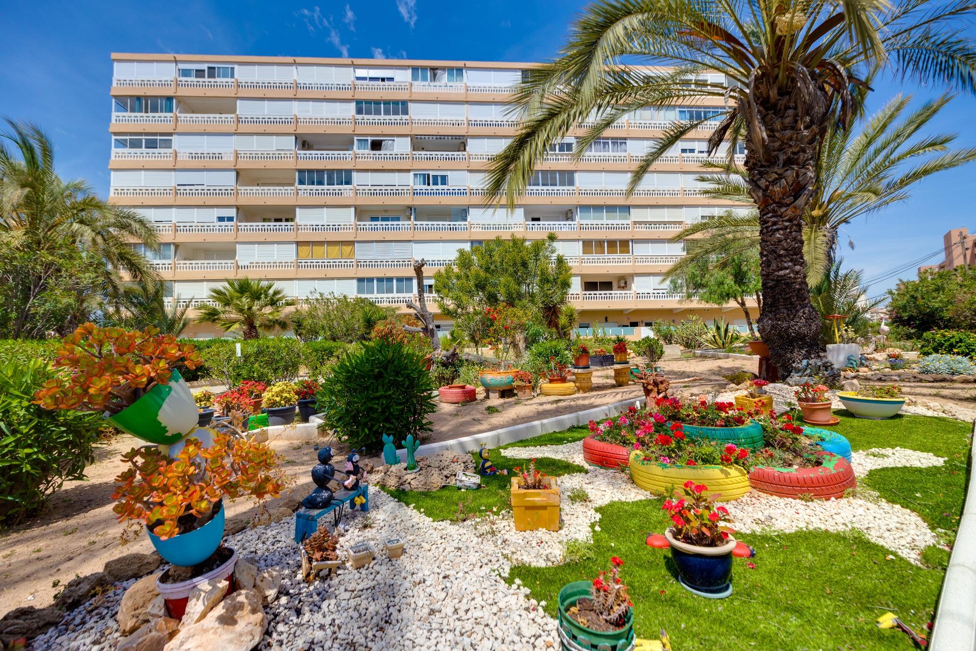Street-level view of apartment building exterior, La Mata, Torrevieja
