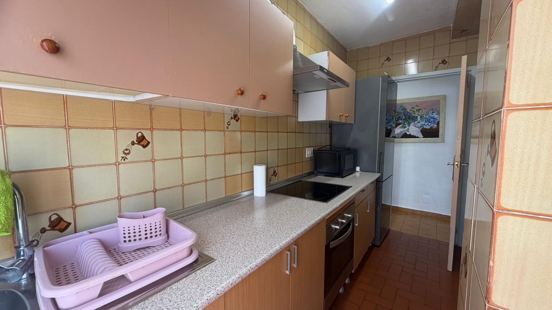 Dining area adjacent to terrace doors in penthouse, Playa de los Locos, Torrevieja