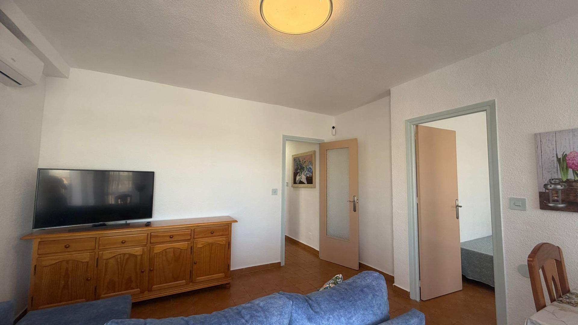 Bedroom with window and natural light in penthouse, Playa de los Locos, Torrevieja