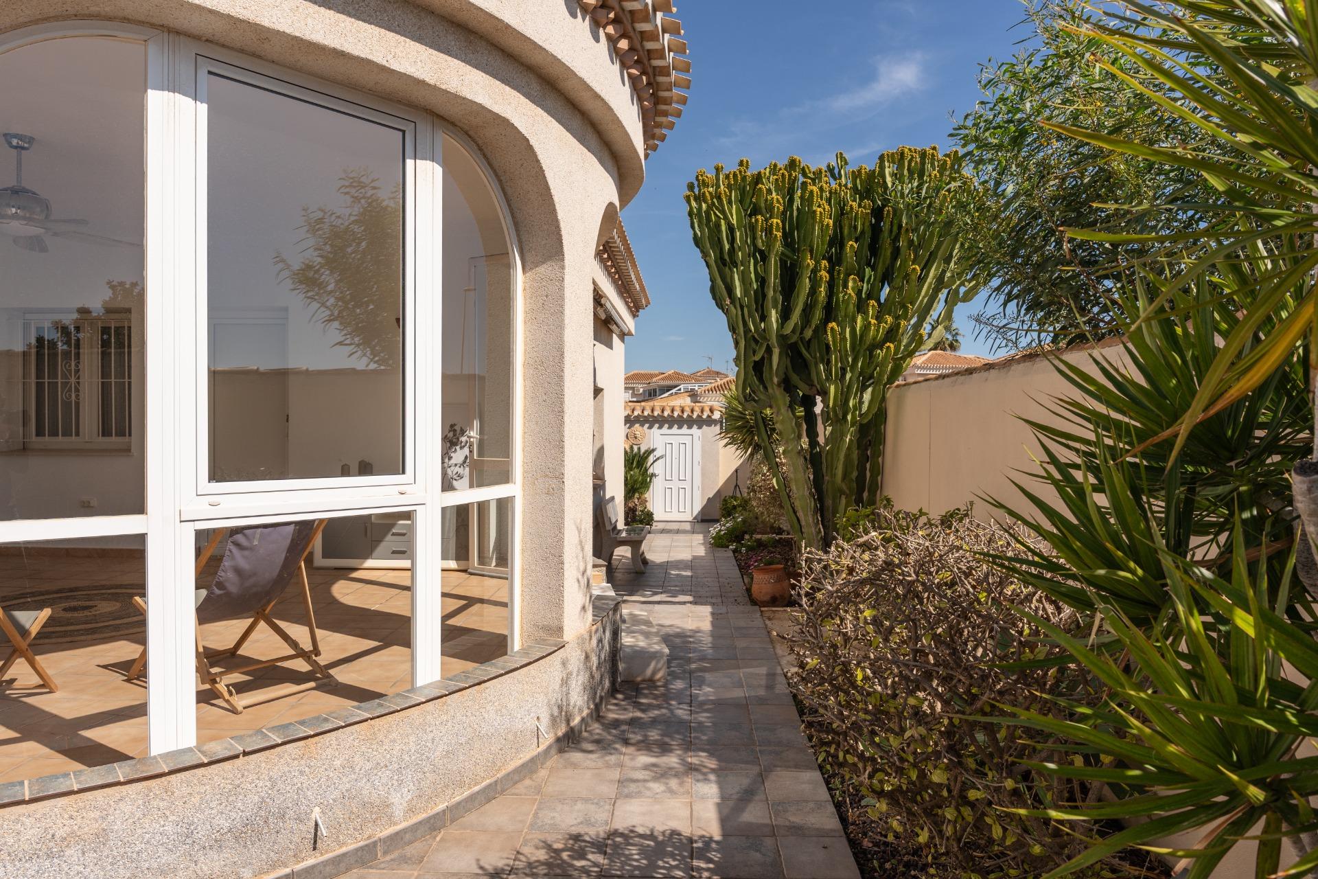 Enclosed pool area viewed from terrace, south-facing villa in Playa Flamenca