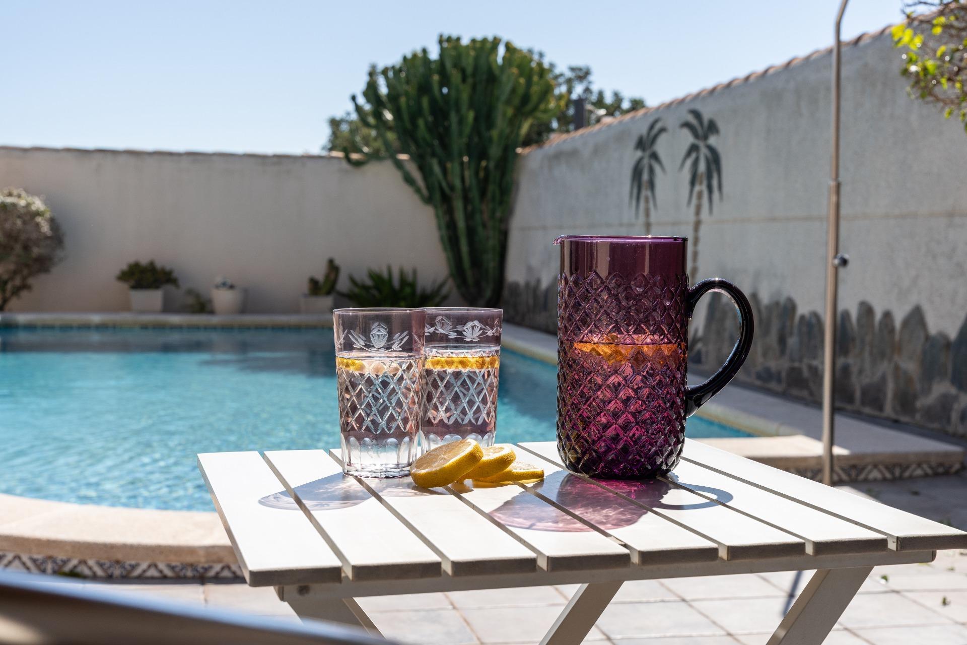Pool terrace viewed through kitchen patio doors, Playa Flamenca villa
