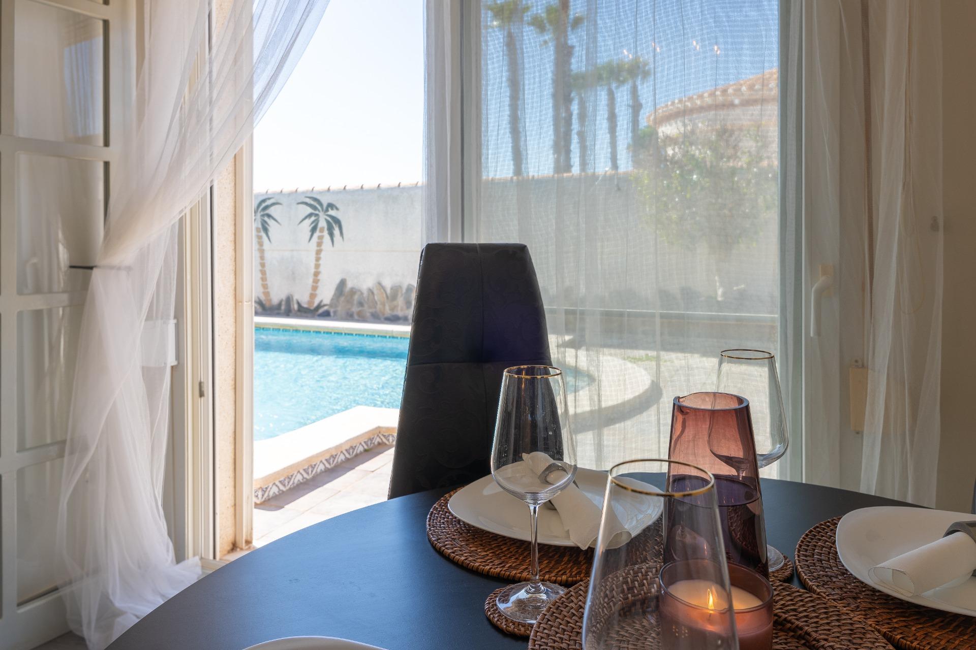 Tiled roof glazed terrace interior viewed from inside, 3-bedroom villa, Playa Flamenca