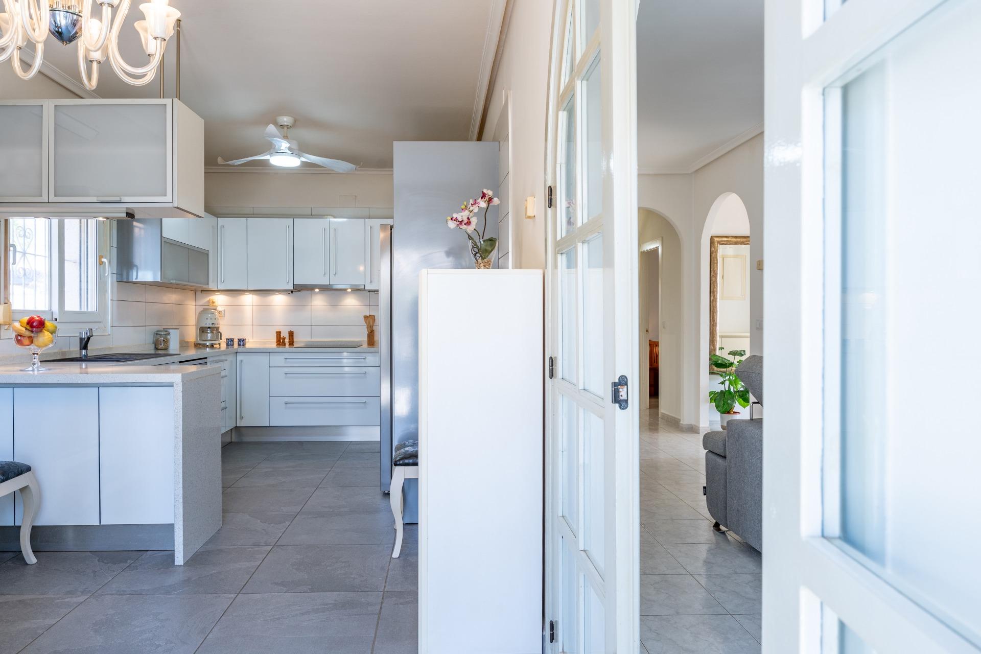 Natural light in living room from south-facing windows, single-storey villa, Playa Flamenca