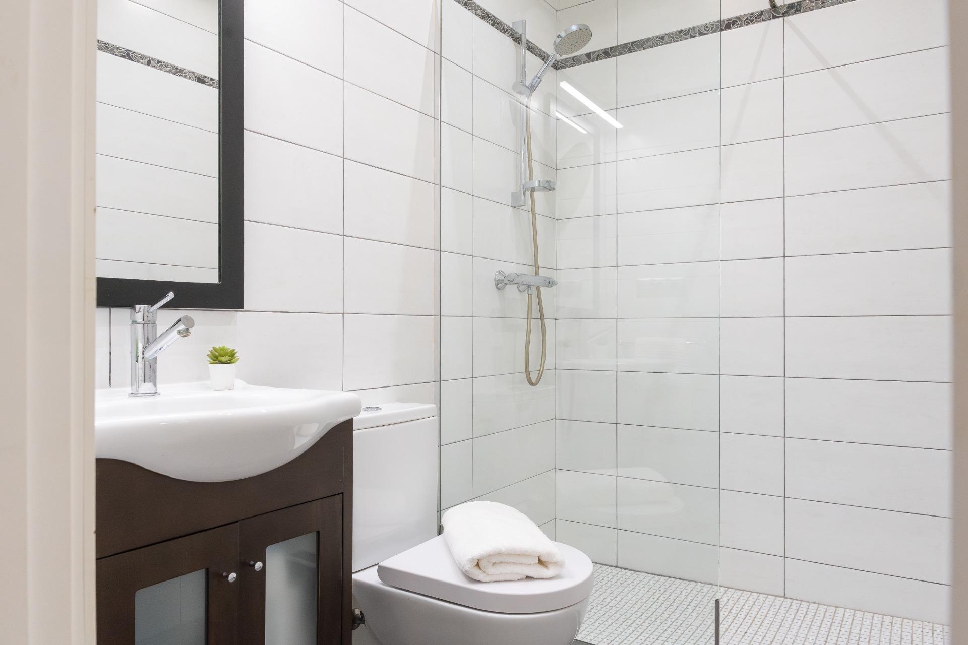 Pergola and built-in barbecue viewed from pool edge, Playa Flamenca villa
