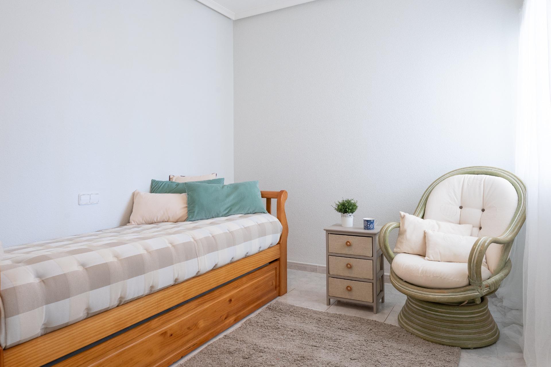 Bedroom window with view to side garden, single-storey villa, Playa Flamenca