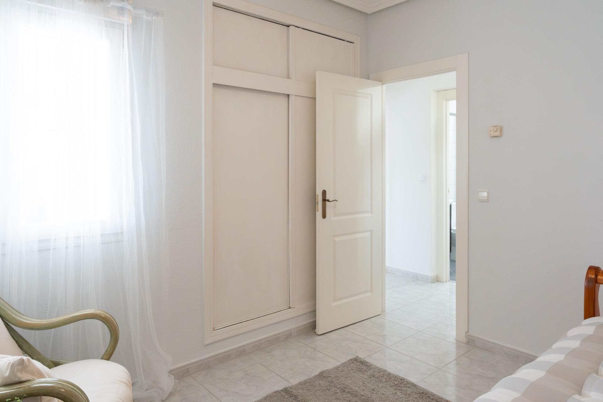 Hallway leading to three bedrooms, detached villa in Playa Flamenca