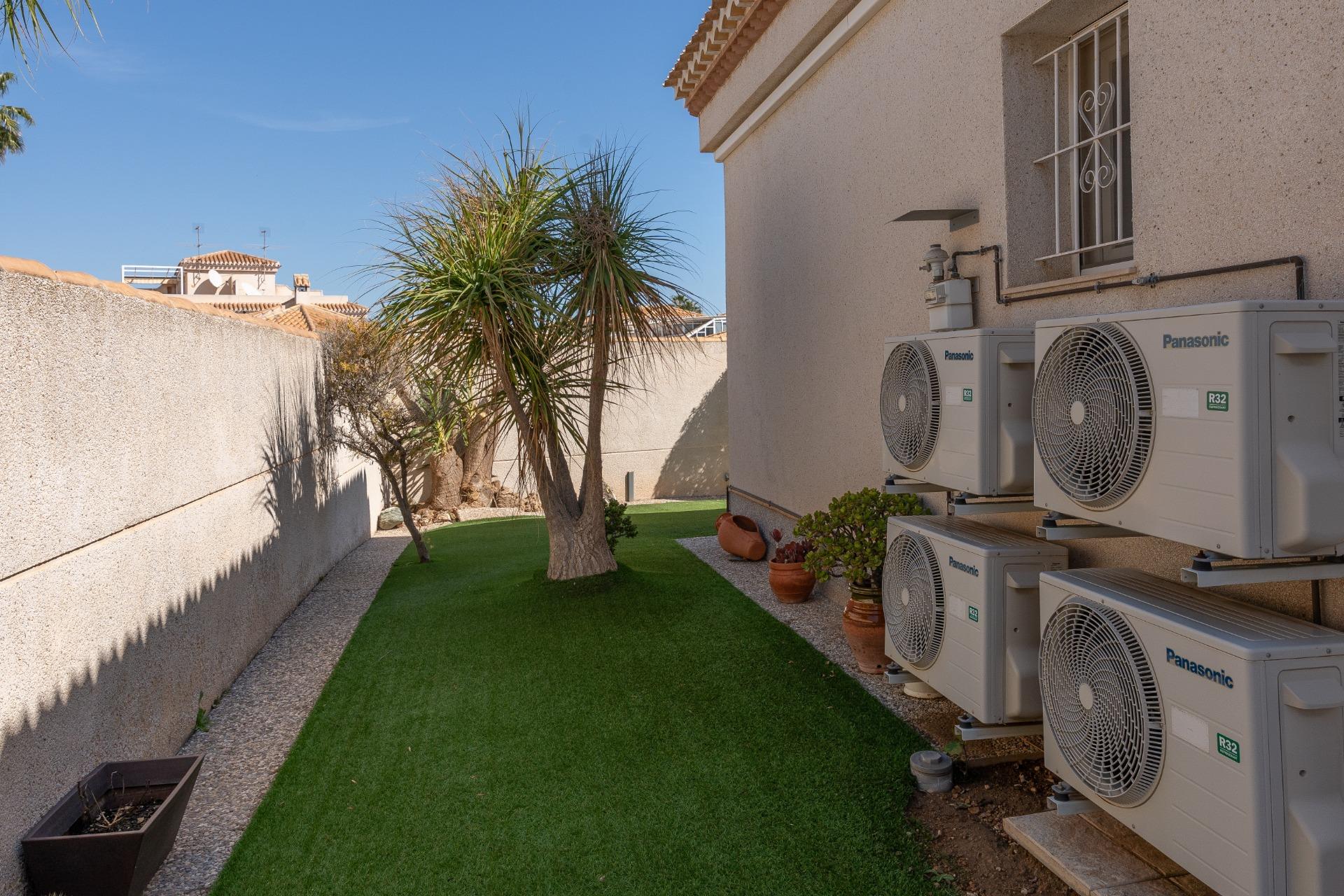 Roof and chimney detail of detached villa, Playa Flamenca, Orihuela Costa