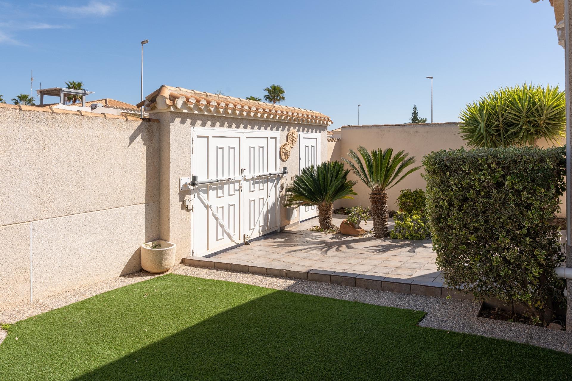 Air conditioning unit on exterior wall, detached villa, Playa Flamenca