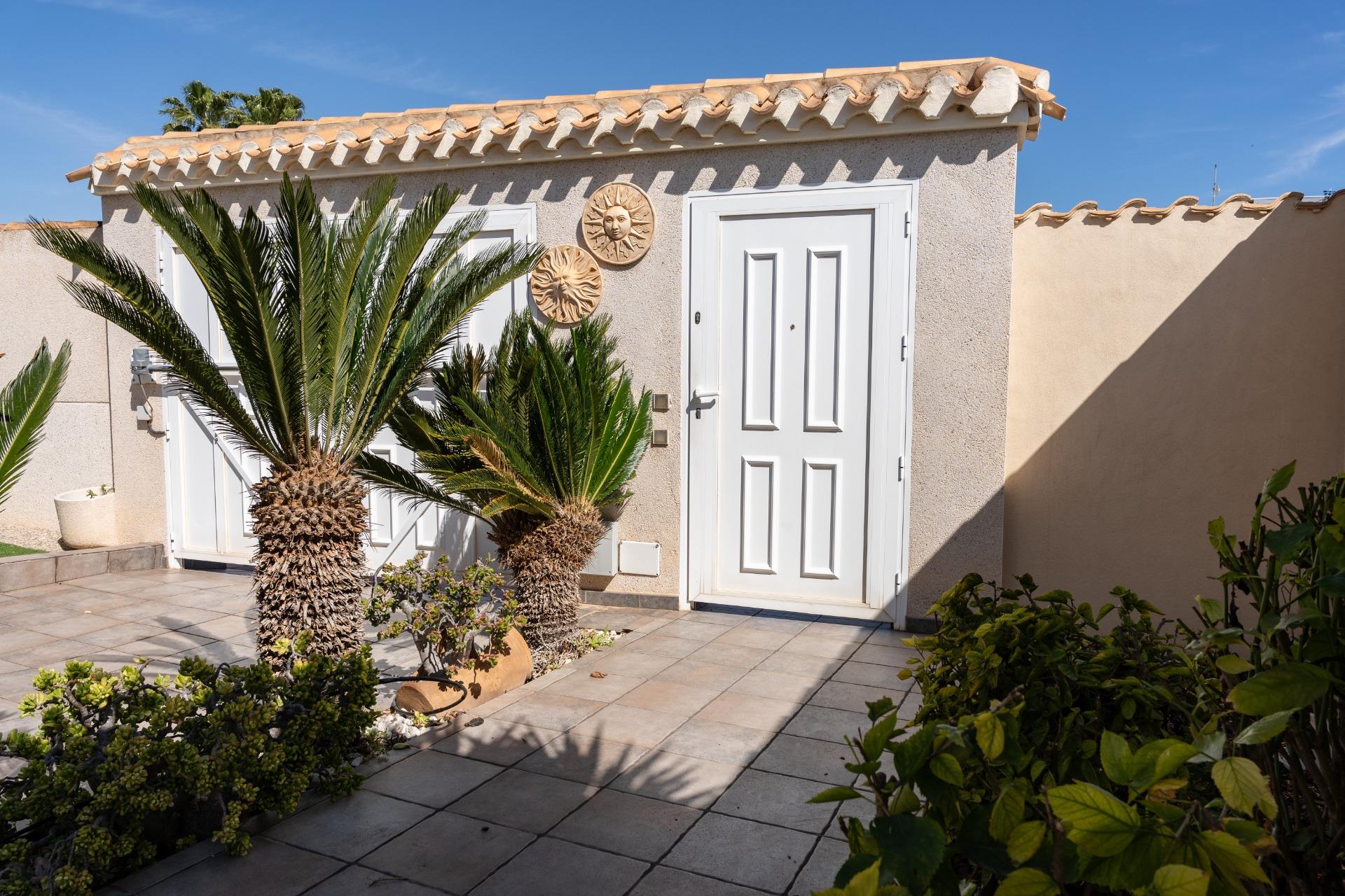 Covered arched terrace with tiled roof, 3-bedroom villa, Playa Flamenca