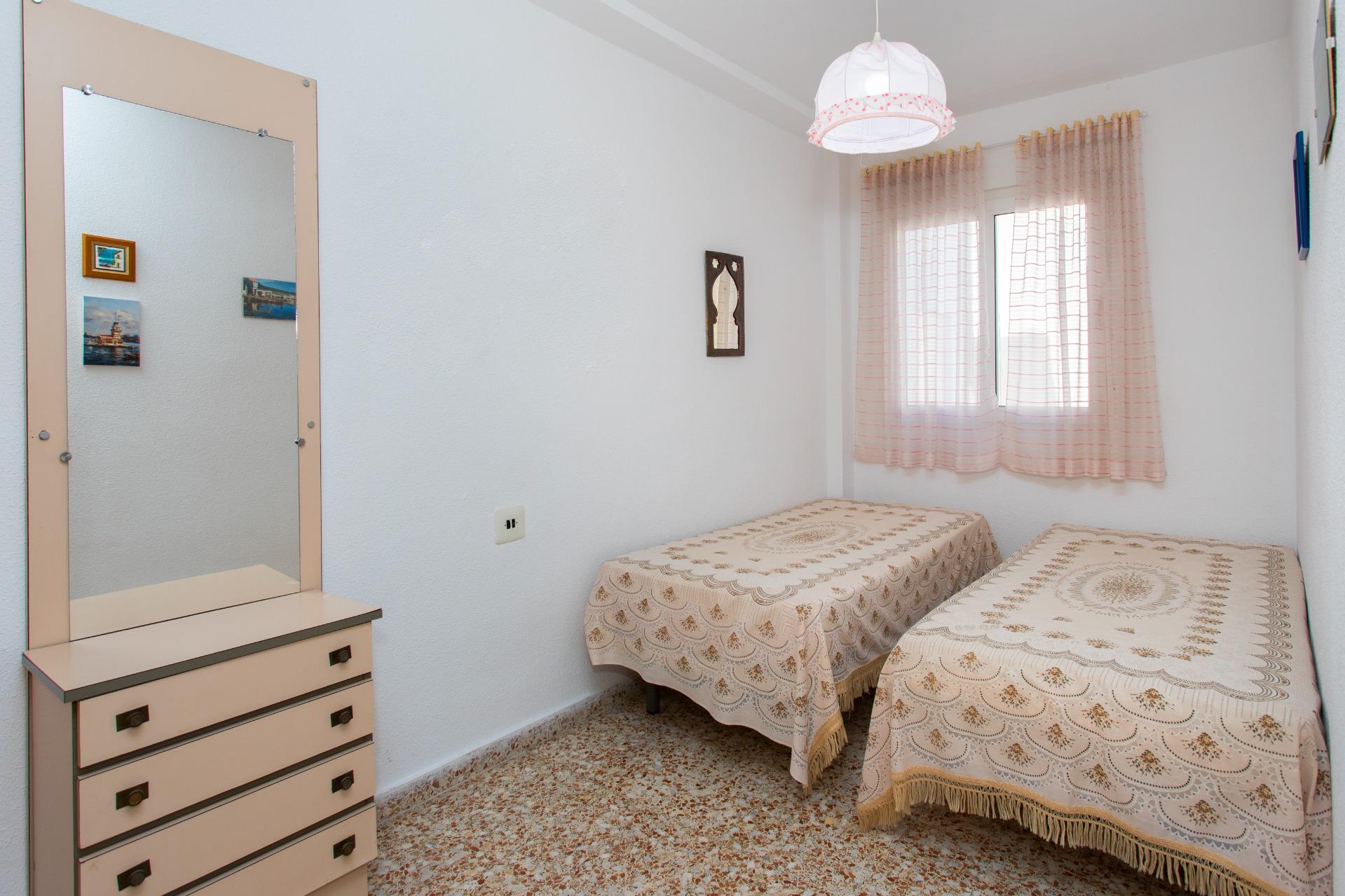 Bedroom showing built-in wardrobe detail in penthouse, Playa del Cura, Torrevieja