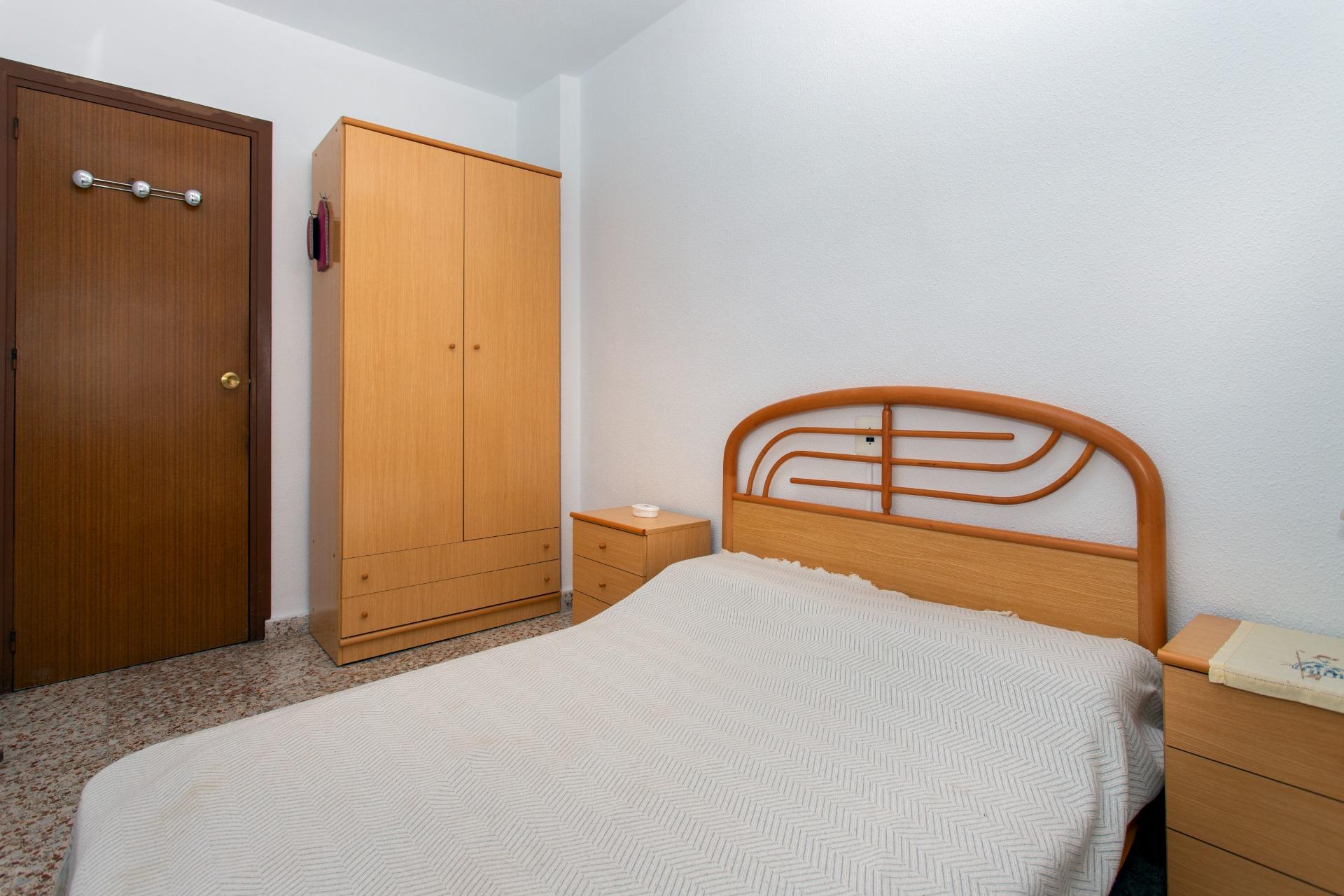 Bedroom with fitted wardrobe doors in penthouse, Playa del Cura, Torrevieja