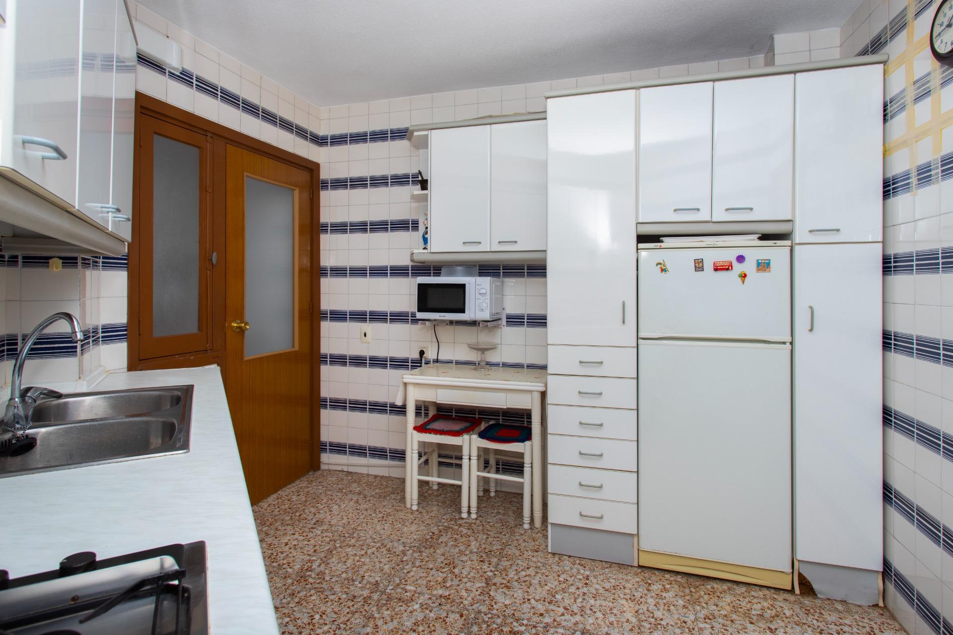 Kitchen appliances and wall-mounted cabinetry in 3-bedroom penthouse, Playa del Cura